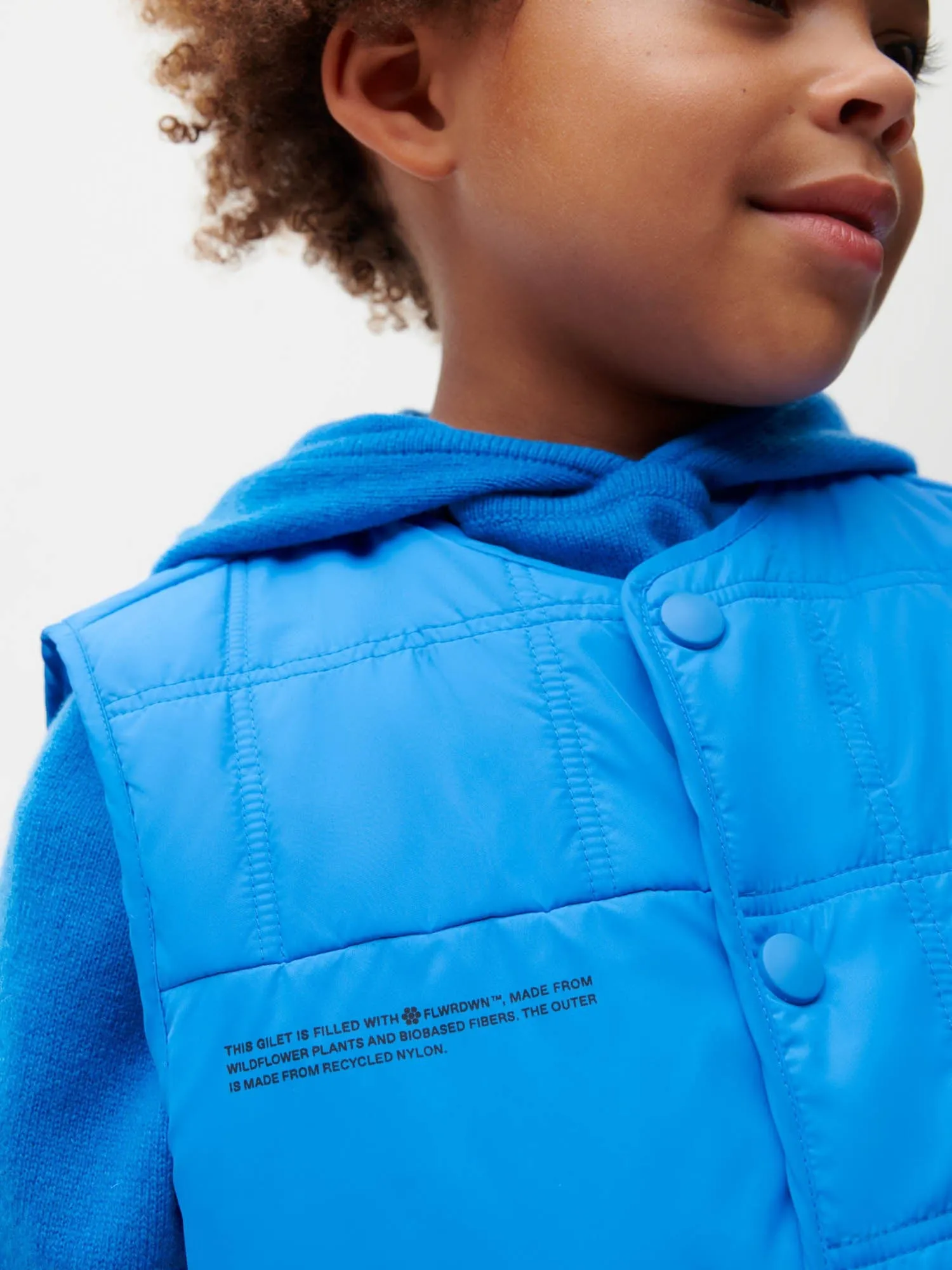 Archive Kid’s Flower-Warmth Quilted Gilet—cerulean blue